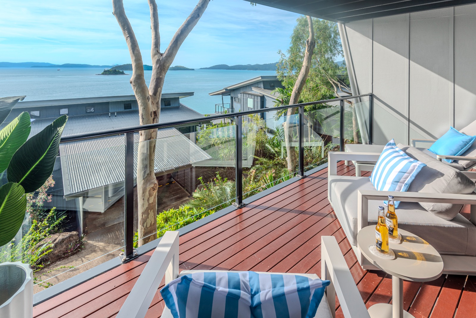 Outdoor lounge balcony with Hamilton Island water views.